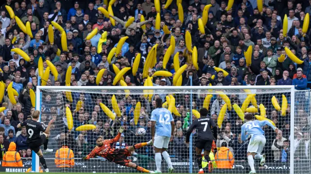 Boos and bananas on day of defiance at Man City